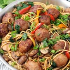 A skillet of teriyaki chicken meatball lo mein.