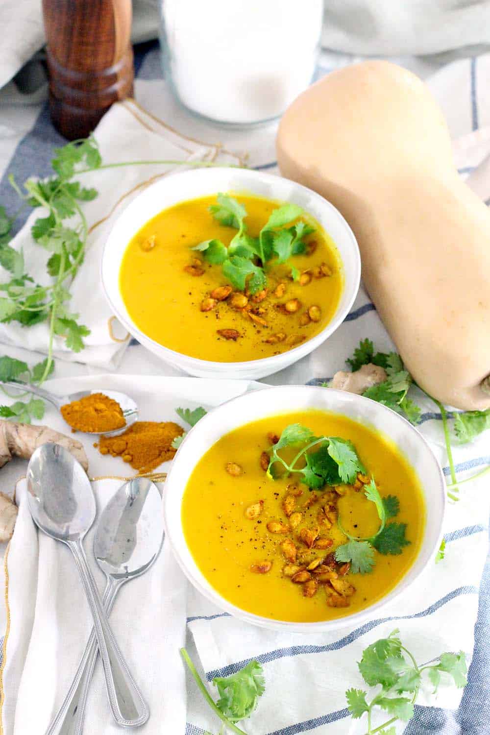 This Ginger Turmeric Butternut Squash Soup is full of healing, healthy ingredients. It's warm, deliciously bright, vegan, low carb, Paleo, and Whole30 compliant!
