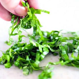 A finished chiffonade of basil for garnish or cooking