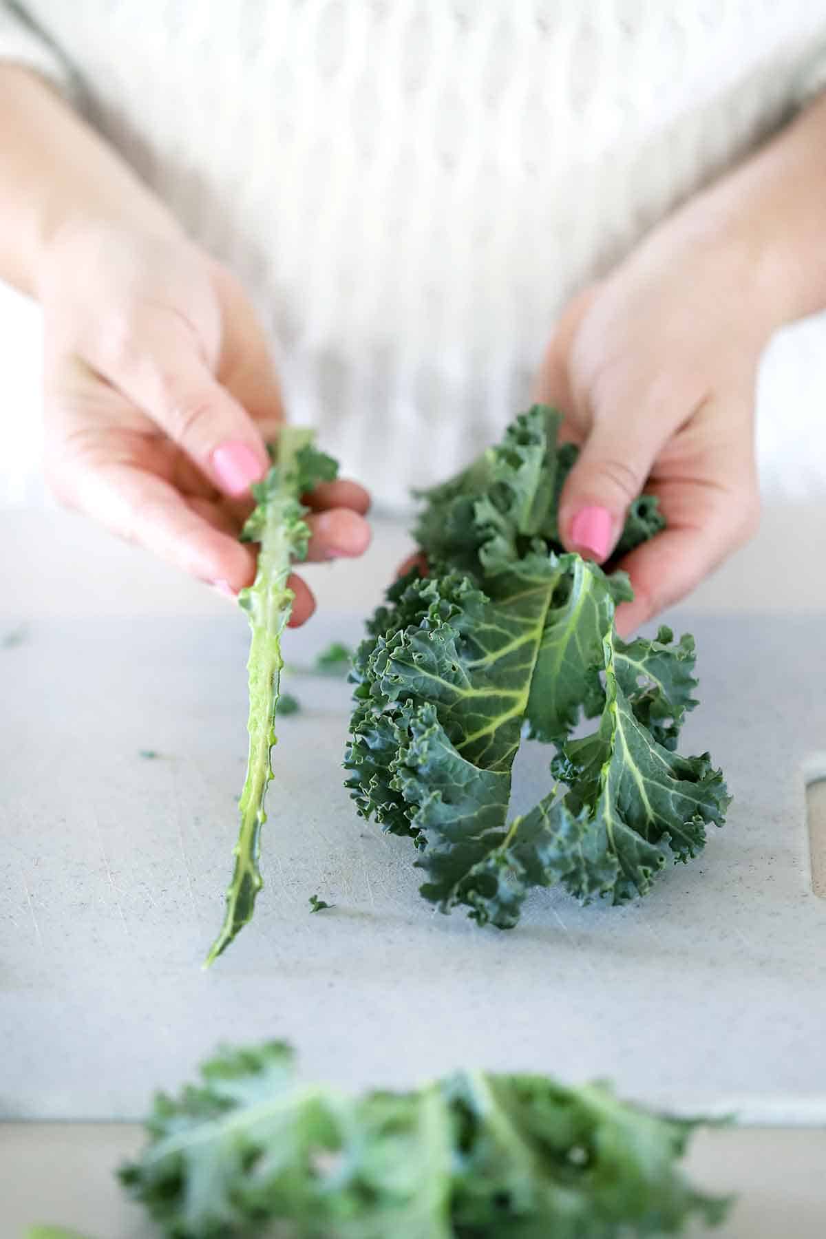 Stem removed from kale leaves.