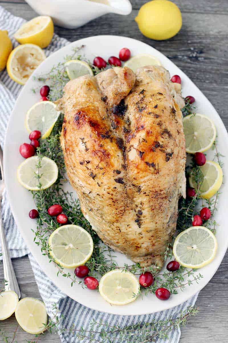 This Instant Pot Turkey Breast with Lemon and Thyme is a Thanksgiving game changer! Cook the whole thing in under an hour for juicy, tender bone-in, skin-on turkey breast.