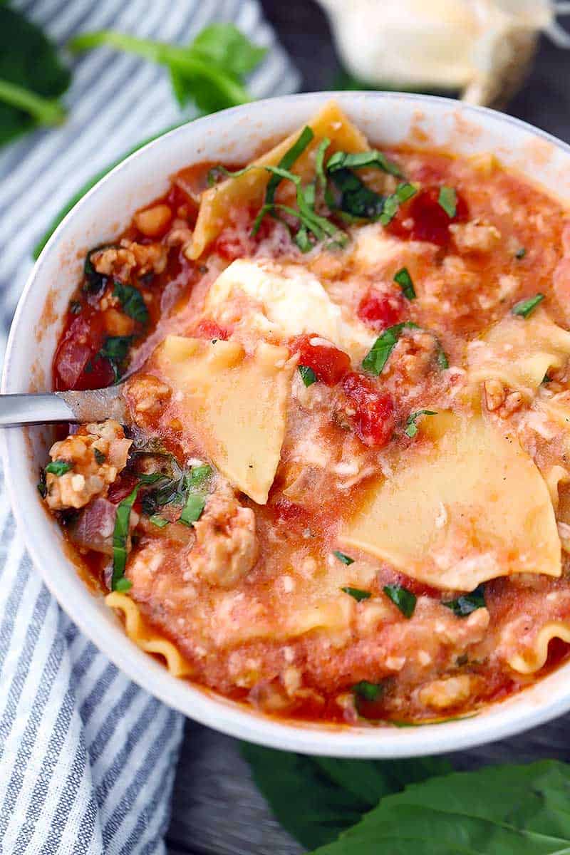 Close up photo of lasagna soup in a bowl.