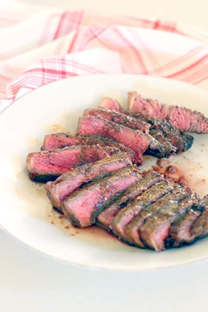 Make the most PERFECT tender, melt-in-your-mouth steak with these 9 easy steps/tricks, with a rich browned butter pan sauce drizzled on top. Paleo and Whole30 approved!