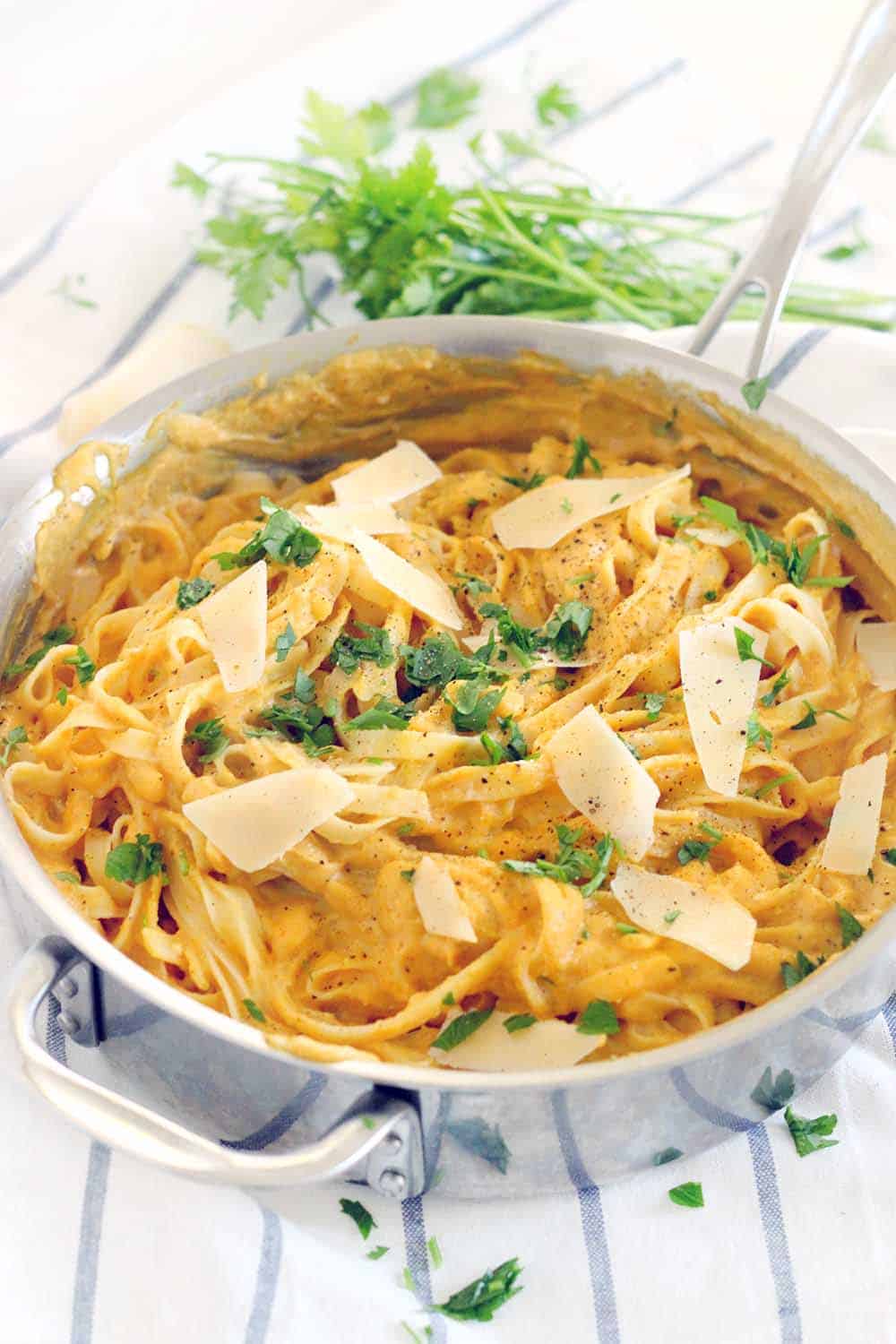 With 60% fewer calories than traditional Alfredo sauce, this Pumpkin Fettucini Alfredo is healthy, creamy, and delicious. It's a great way to sneak veggies into a main course, especially in the fall season!