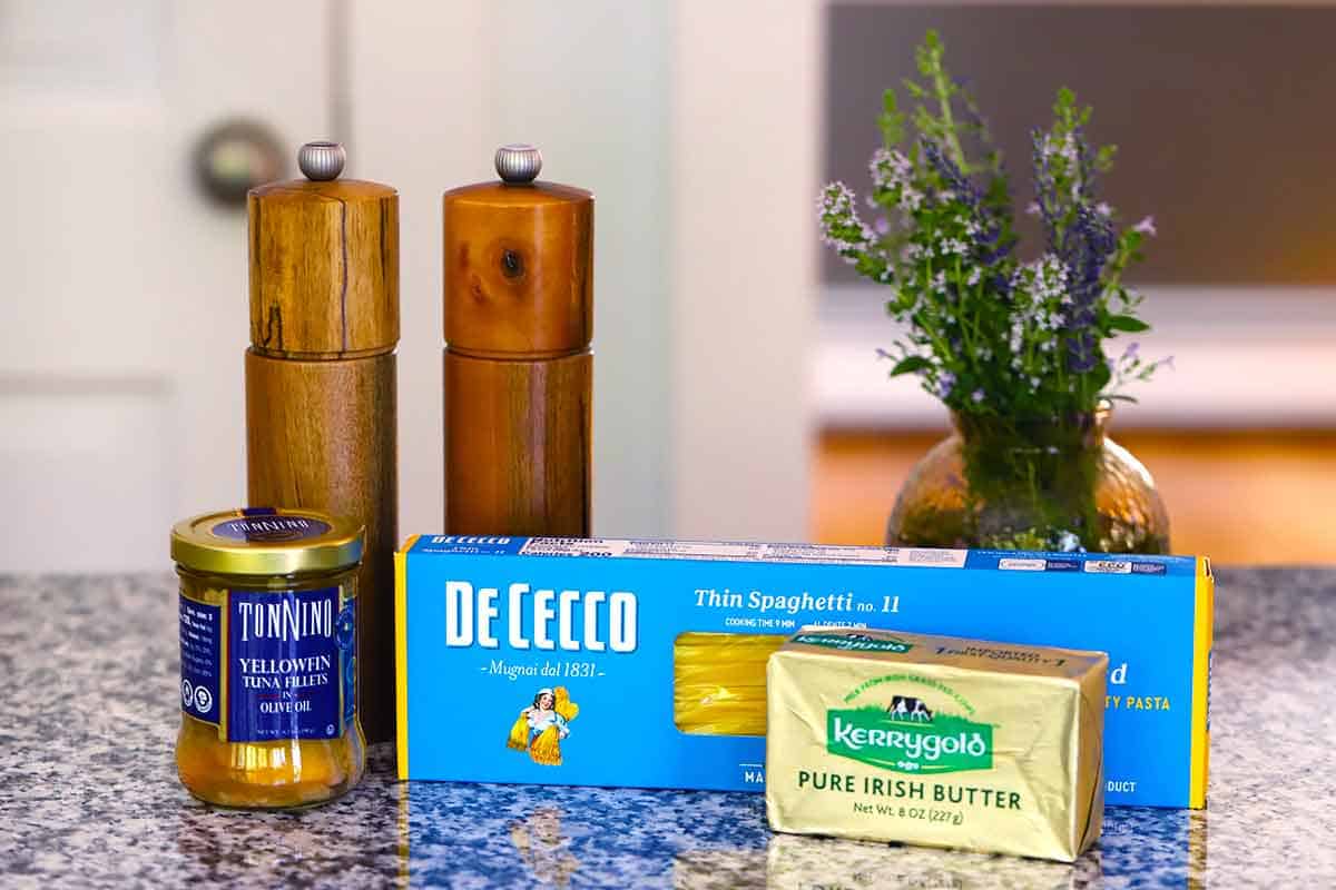 Ingredients needed for spaghetti tonno e burro - spaghetti, butter, tuna packed in oil, pepper, and salt.