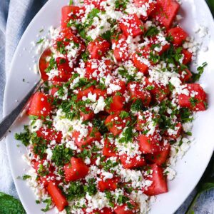 Square photo of watermelon feta mint salad.